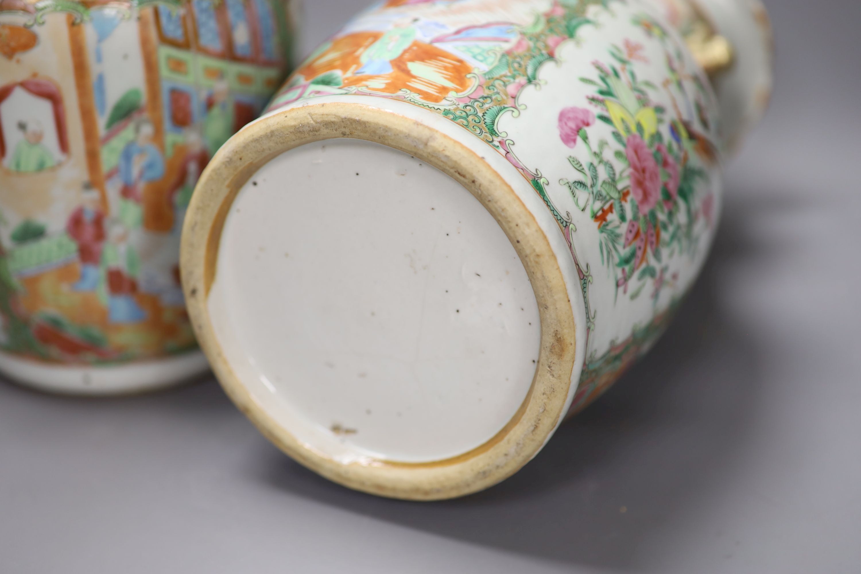 A pair of late 19th century Chinese famille rose vases, height 36cm